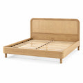 Letto matrimoniale in legno con testiera in rattan
